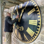 Restored Clock Face Returns to the Tower